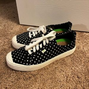 Black and white polka dot Cariuma sneakers size 12